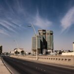 cars on road near buildings during daytime