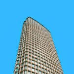 A tall building stretches towards the sky.