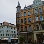 View of historic buildings in Hannover's public square, showcasing classic German architecture.