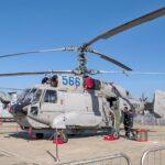 Military helicopters showcased at Aero India 2025 in Bengaluru, India, emphasizing aviation technology and defense.