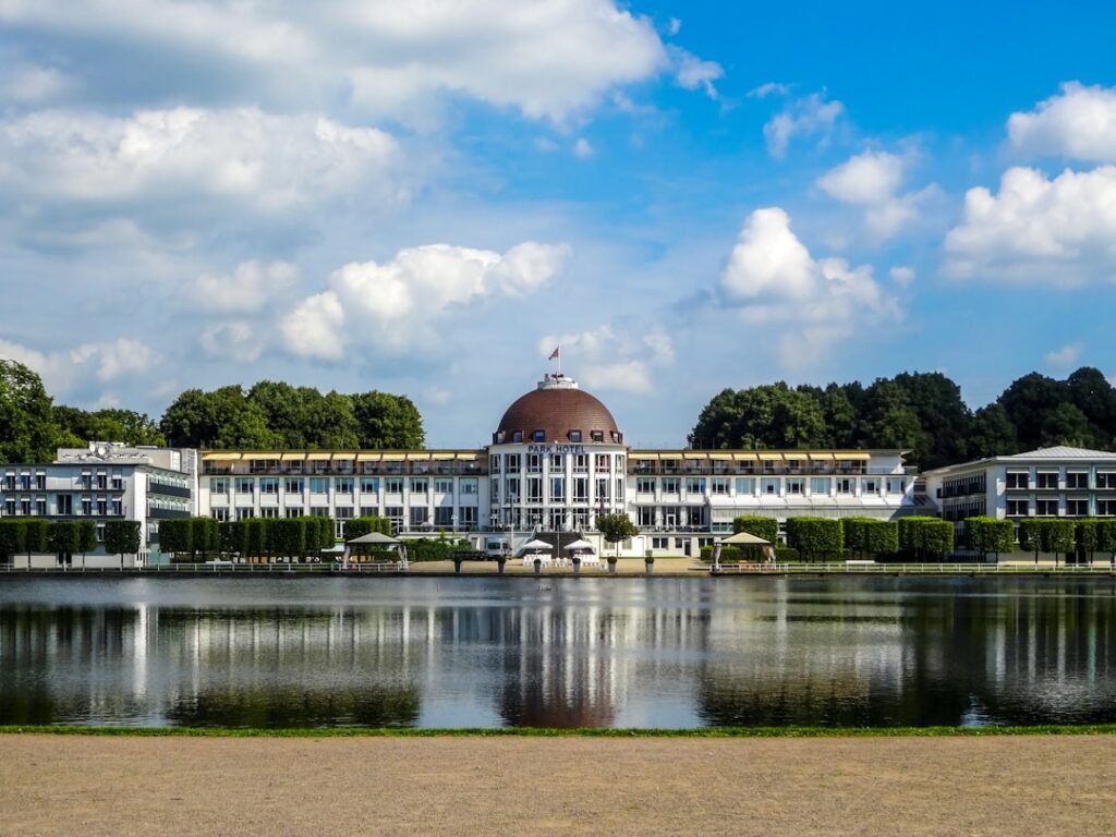 Grand building with dome reflected in water