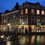 a building that has a bike parked in front of it