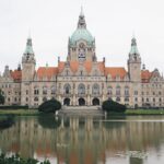 lake in front of building