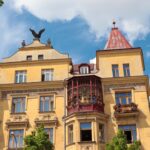 a large building with a bird on top of it