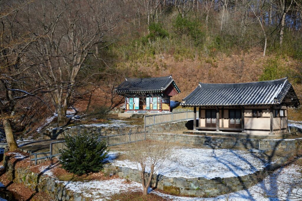 A couple of buildings sitting on top of a snow covered ground