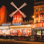 A large building with a windmill on top of it