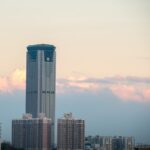 a tall building with a clock on the top of it