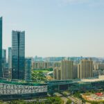 city skyline under blue sky during daytime