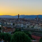 a city with a mountain in the background
