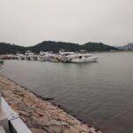 a bunch of boats that are sitting in the water