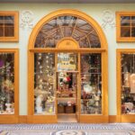 Elegant storefront of a boutique in the historic Galerie Vivienne, Paris.