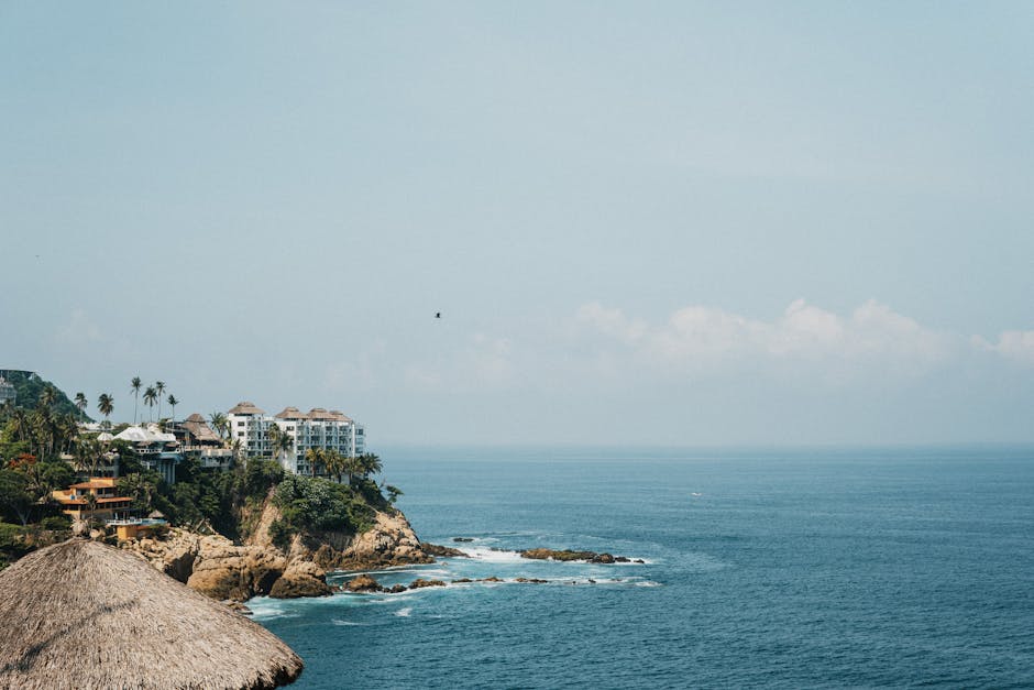 Beautiful coastal landscape with ocean view and resort hotels in Acapulco, Mexico.