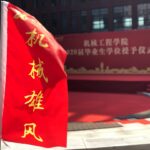 a red flag with yellow stars