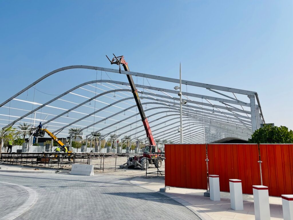 a large metal structure with a crane on top of it
