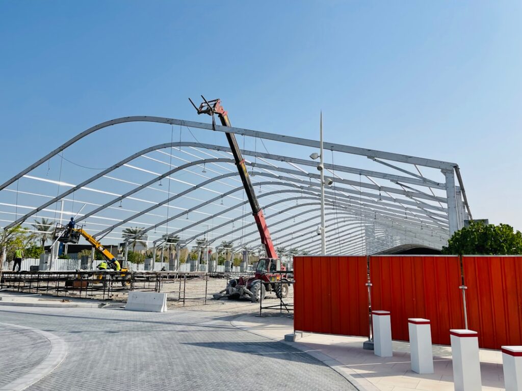 a large metal structure with a crane on top of it