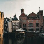 a body of water with buildings along it