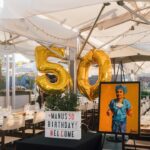 a tent with tables and chairs