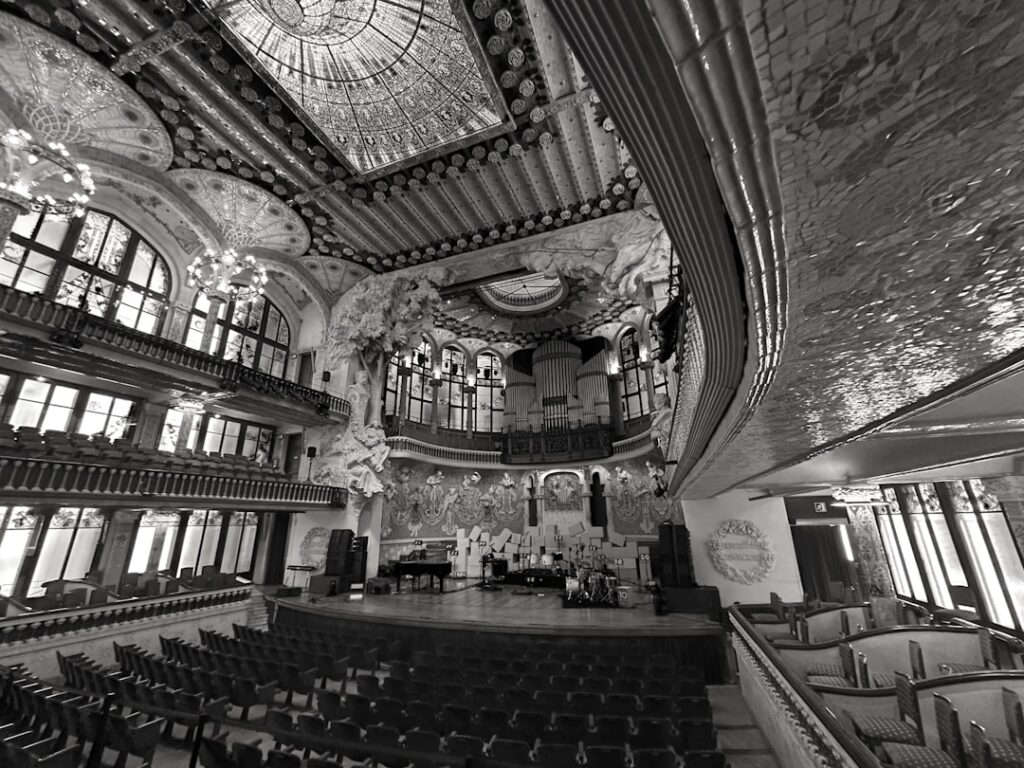 Ornate concert hall interior with stage and seating